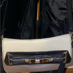 Cross Body Chaps bag can also be worn as a wristlet